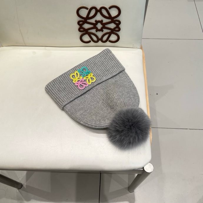 Вязаная шапка с лисьим мехом фото 6