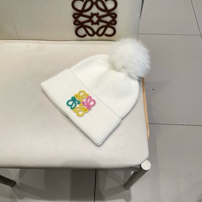 Вязаная шапка с лисьим мехом фото 7