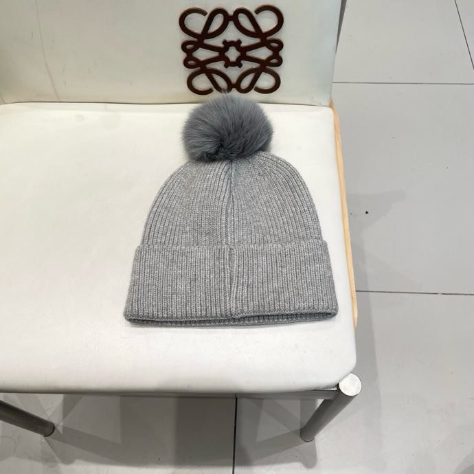 Вязаная шапка с лисьим мехом фото 7