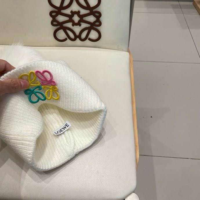 Вязаная шапка с лисьим мехом фото 8