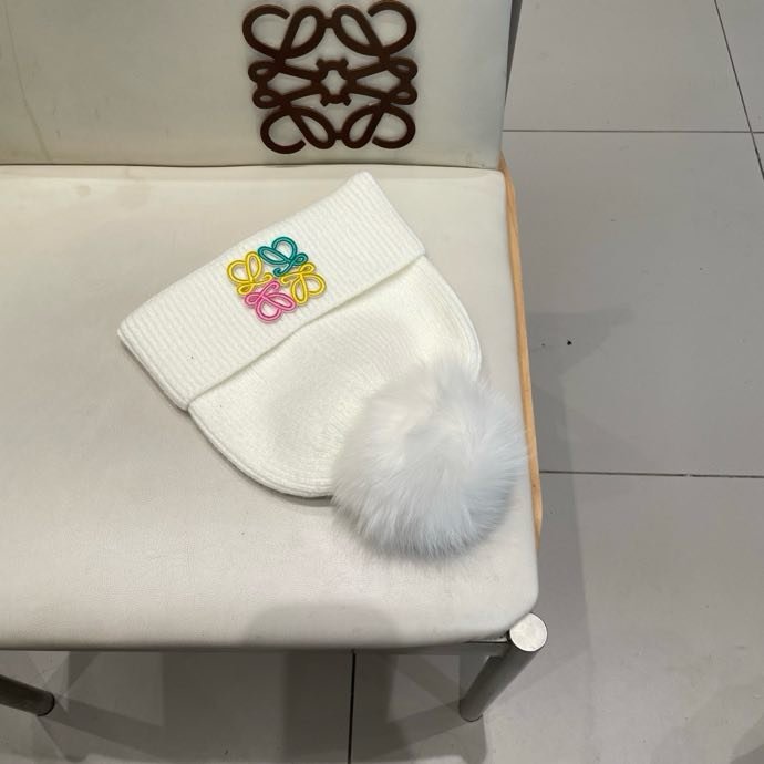 Вязаная шапка с лисьим мехом фото 9