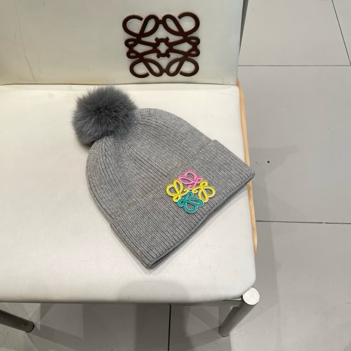 Вязаная шапка с лисьим мехом фото 9