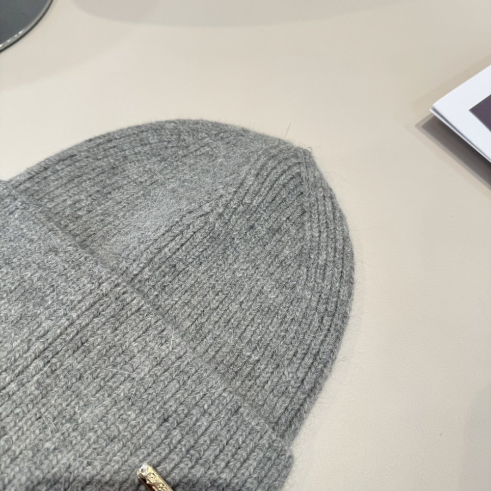 В'язана вовняна шапка фото 3