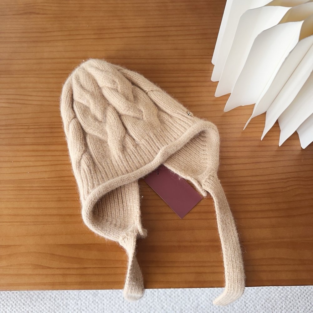 В'язана вовняна шапка фото 4