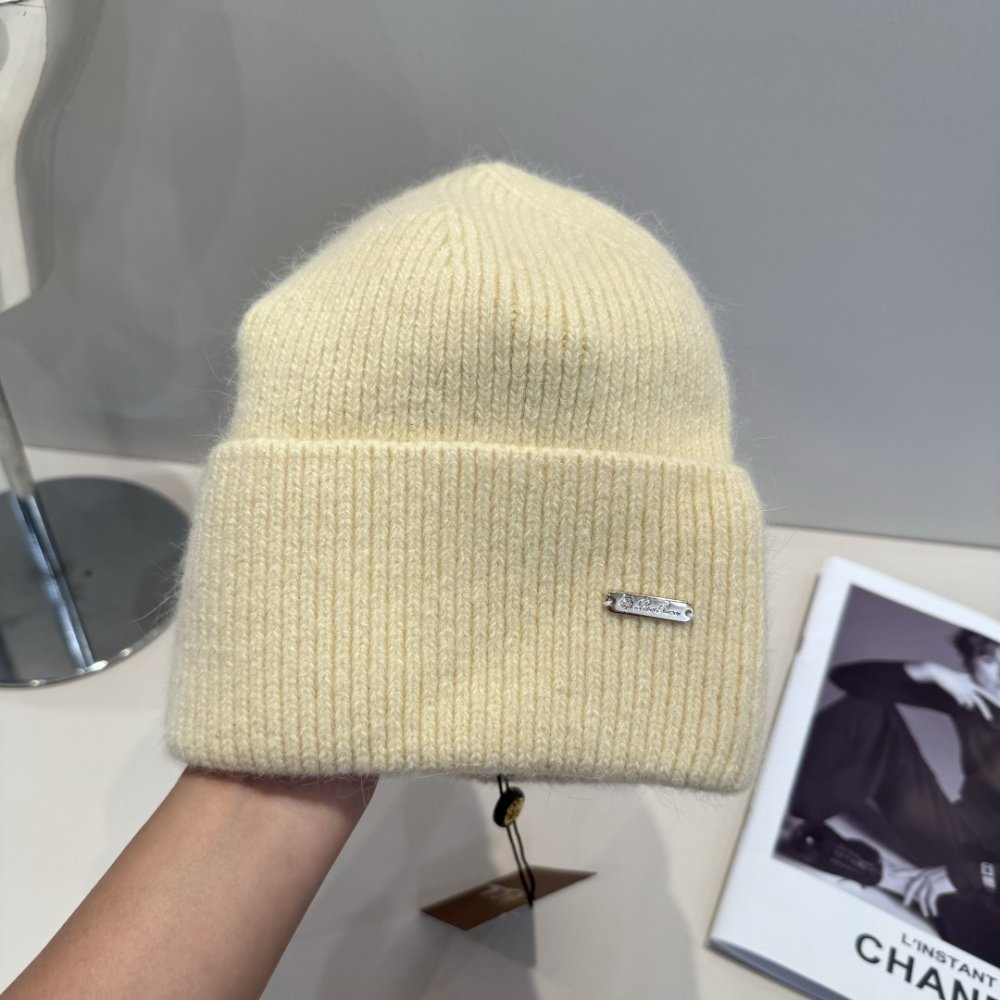 В'язана вовняна шапка фото 4