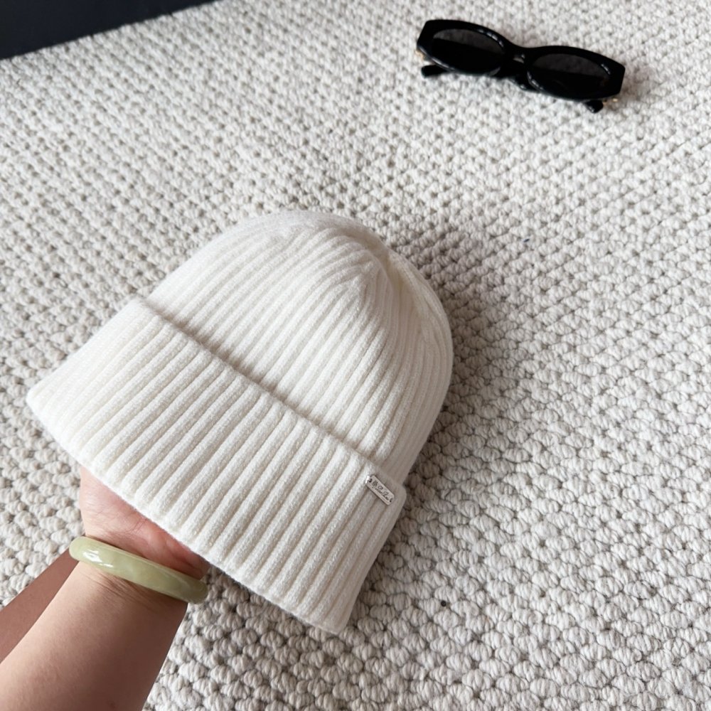 В'язана вовняна шапка фото 8