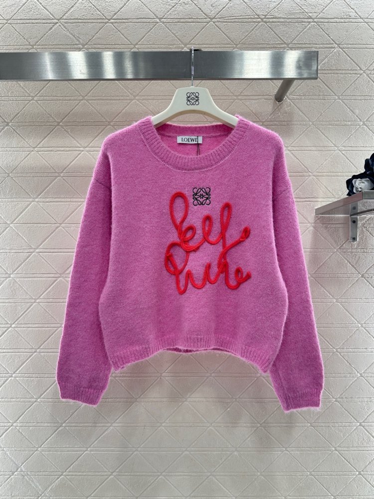 Вязаный пуловер женский