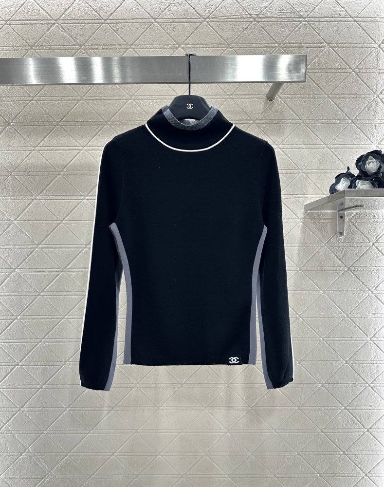 Вязаный свитер с высоким воротом