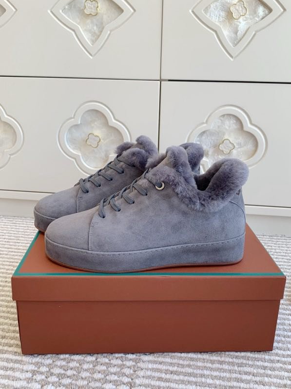 Suede sneakers on fur
