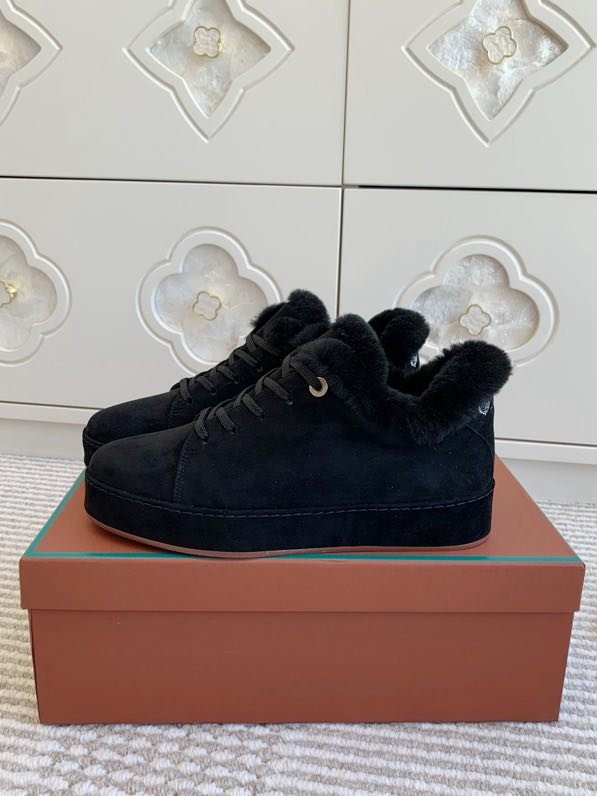 Suede sneakers on fur