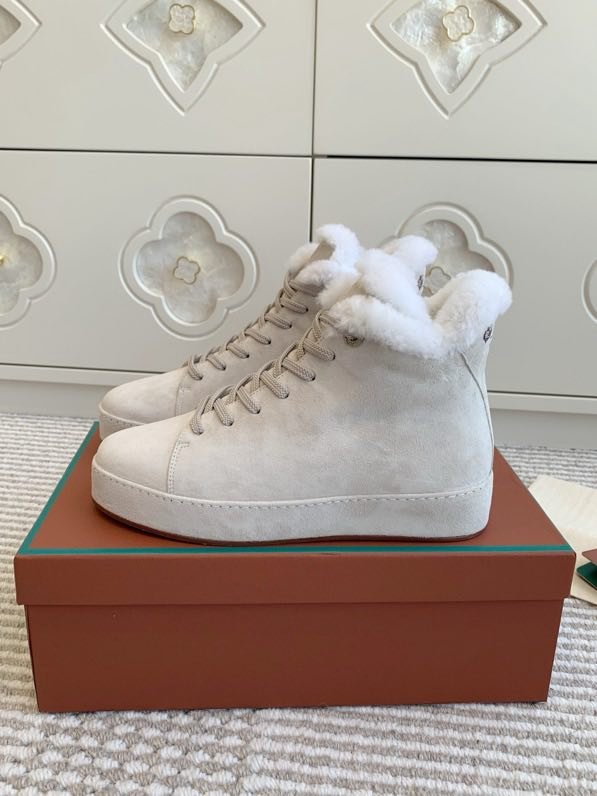 Suede sneakers on fur