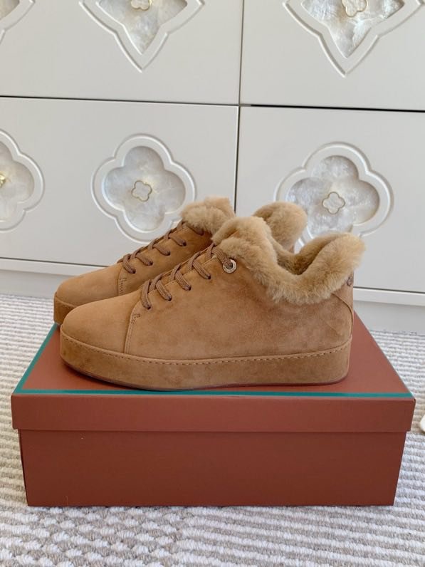 Suede sneakers on fur