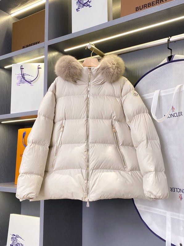 Women's short feather jacket from hood фото 5