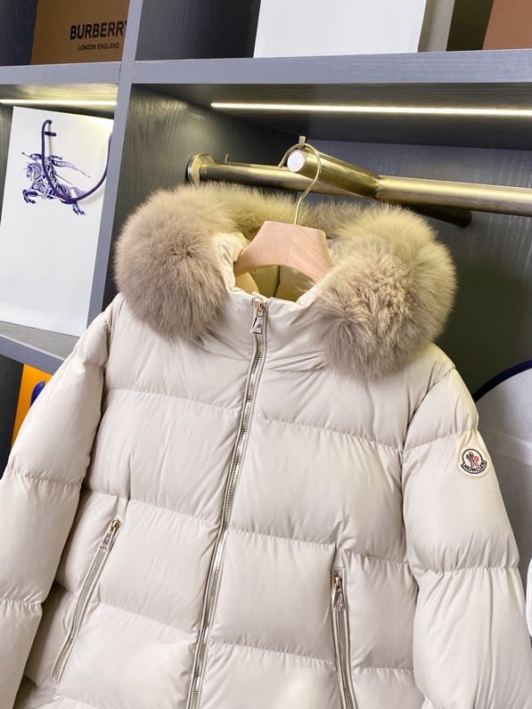 Women's short feather jacket from hood фото 6