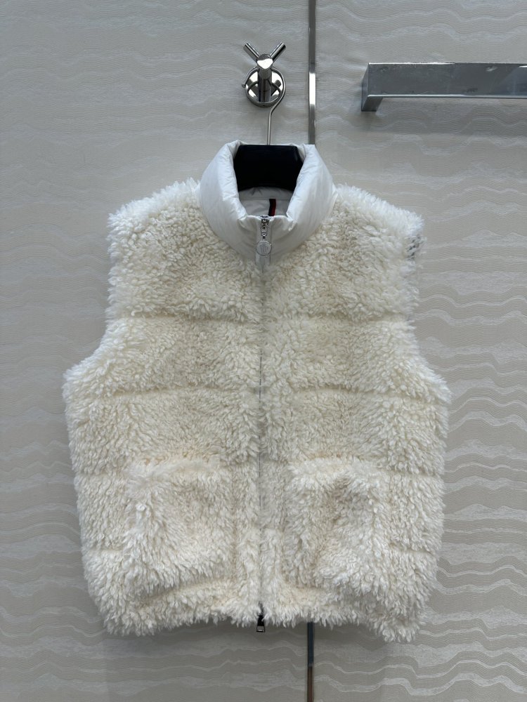 Жилетка хутряної на пуху жіноча