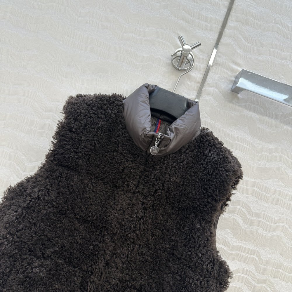 Жилетка хутряної на пуху жіноча фото 2