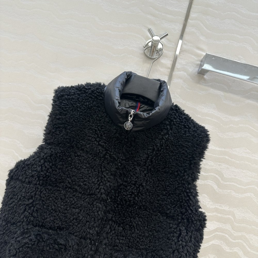 Жилетка хутряної на пуху жіноча фото 2