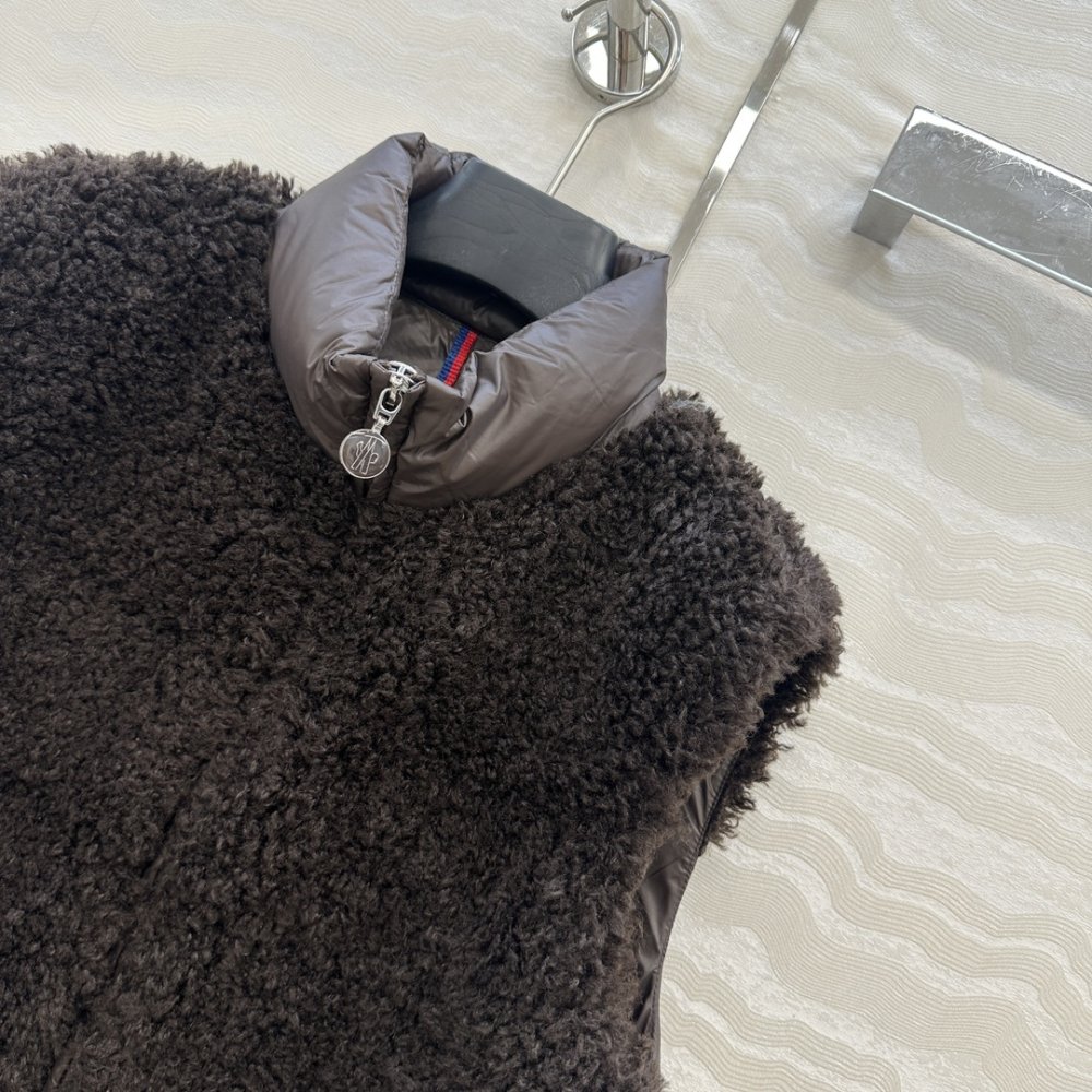 Жилетка хутряної на пуху жіноча фото 3