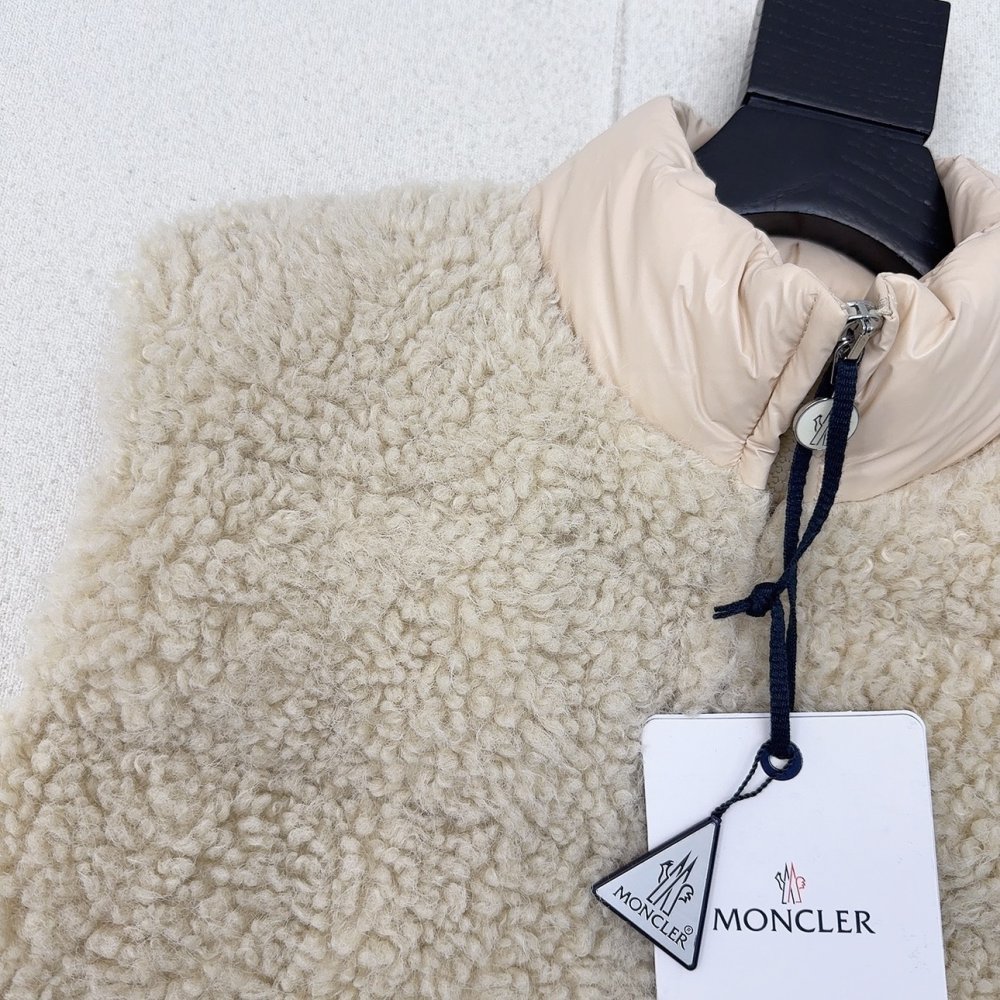 Жилетка хутряної на пуху жіноча фото 3