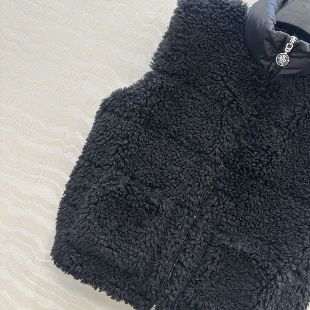 Жилетка хутряної на пуху жіноча фото 4