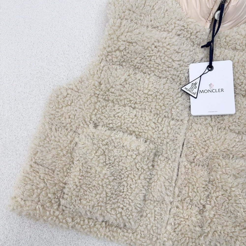 Жилетка хутряної на пуху жіноча фото 4