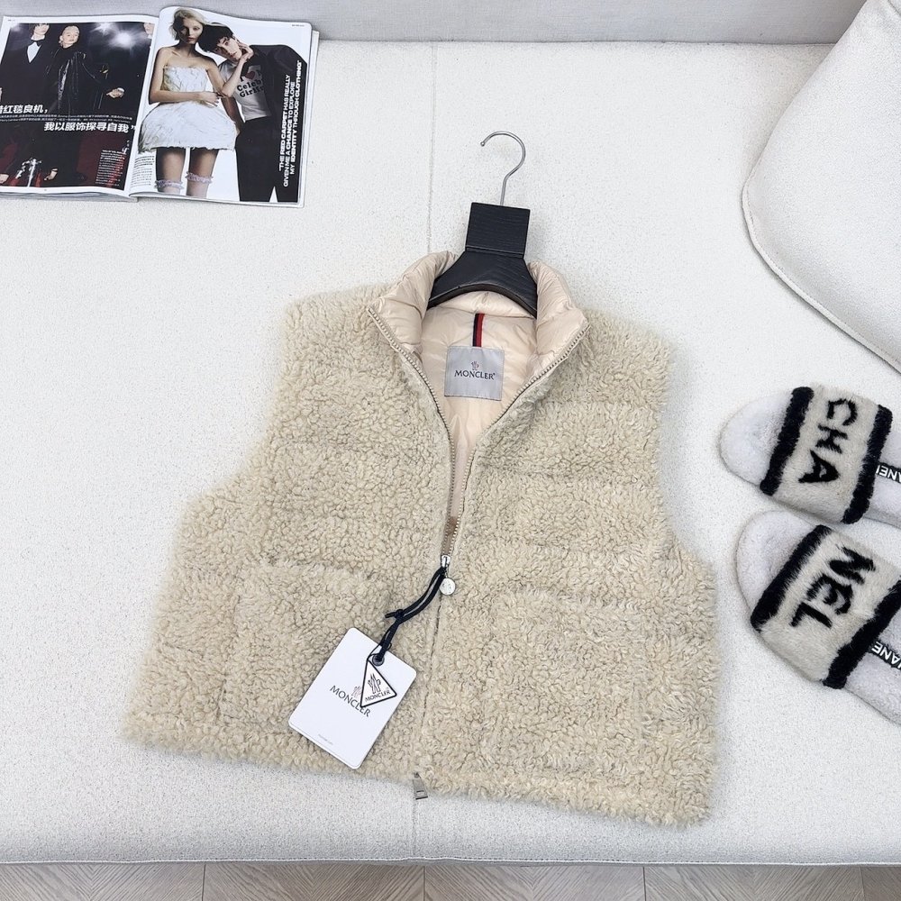 Жилетка хутряної на пуху жіноча фото 5