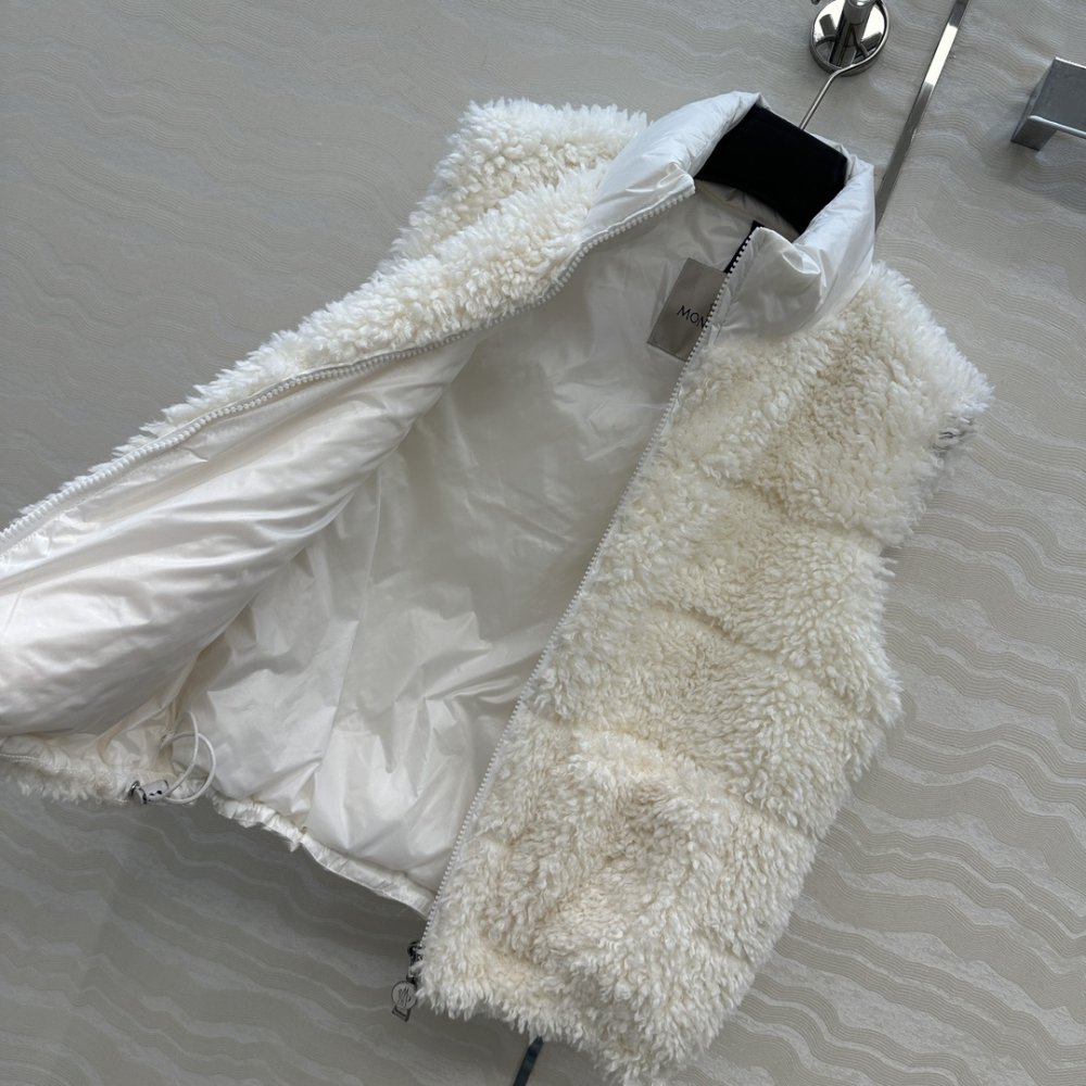 Жилетка хутряної на пуху жіноча фото 7