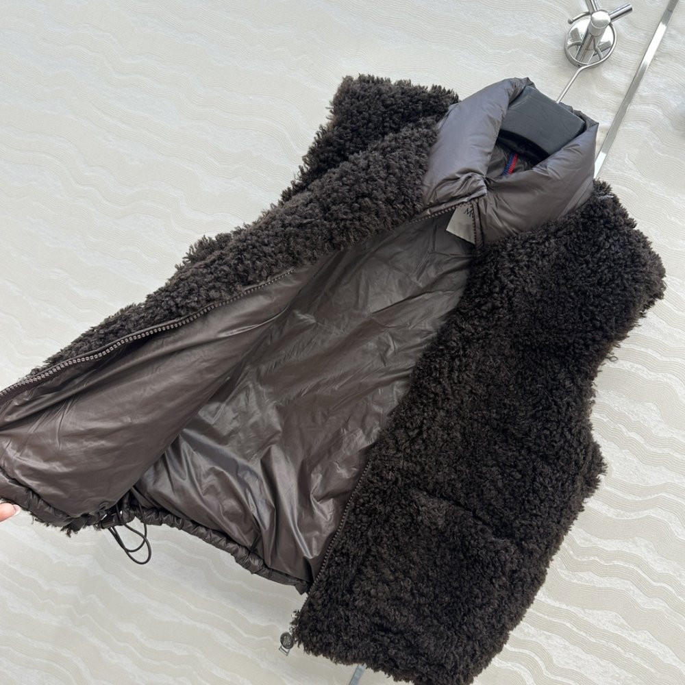 Жилетка хутряної на пуху жіноча фото 7