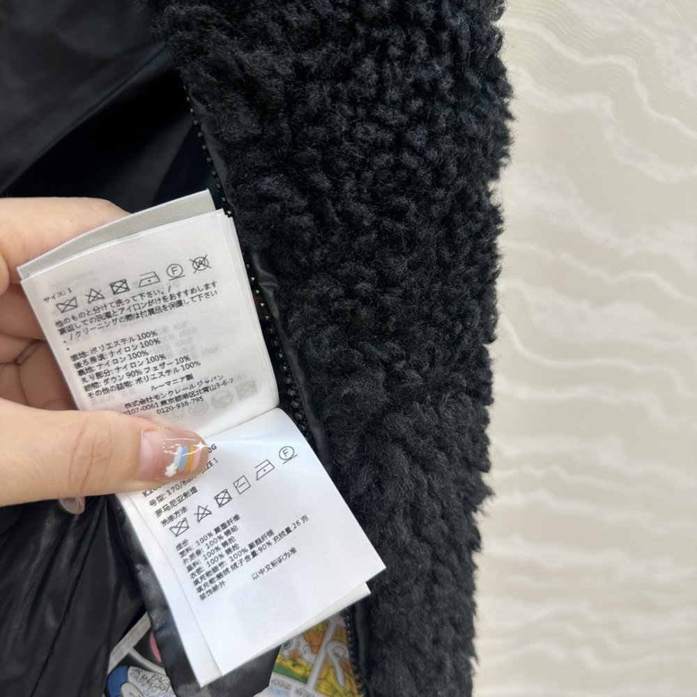 Жилетка хутряної на пуху жіноча фото 7