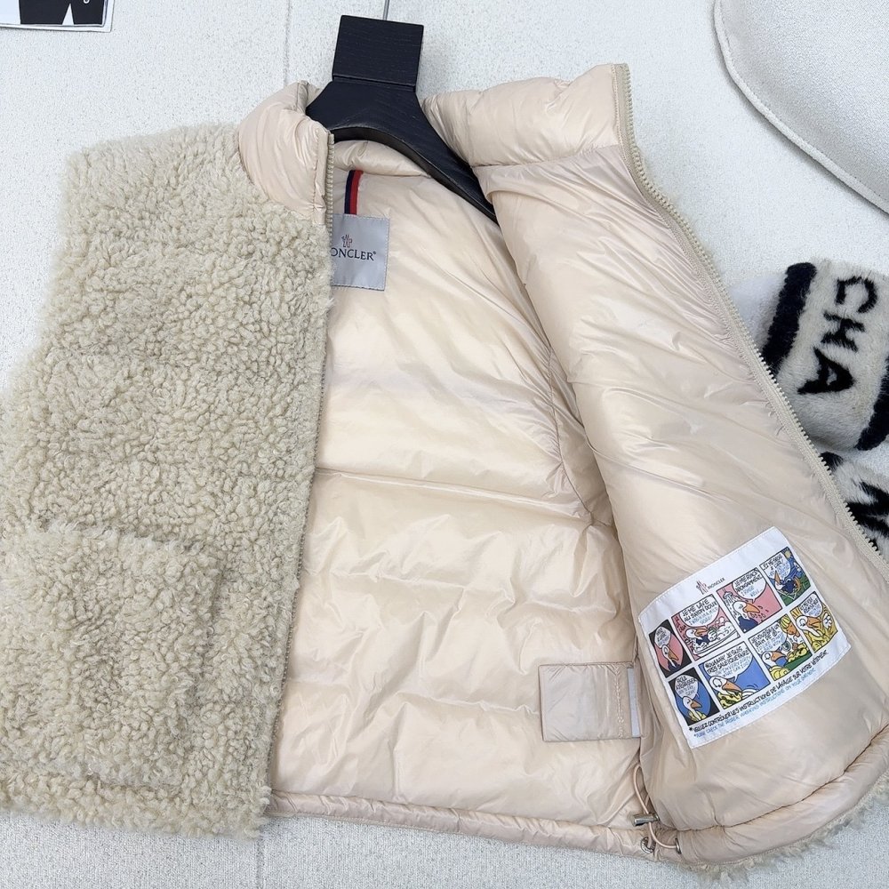 Жилетка хутряної на пуху жіноча фото 7