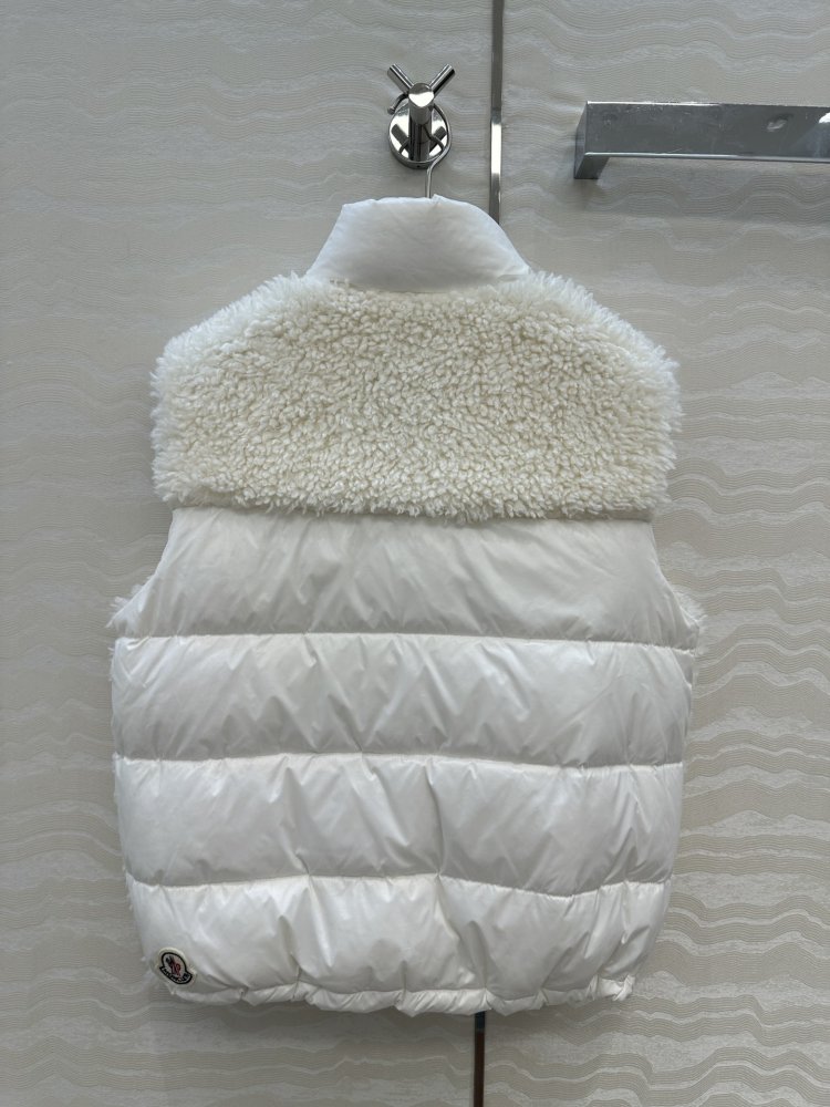 Жилетка хутряної на пуху жіноча фото 9