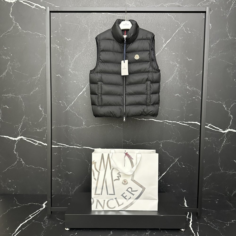 Жилетка на пуху мужская