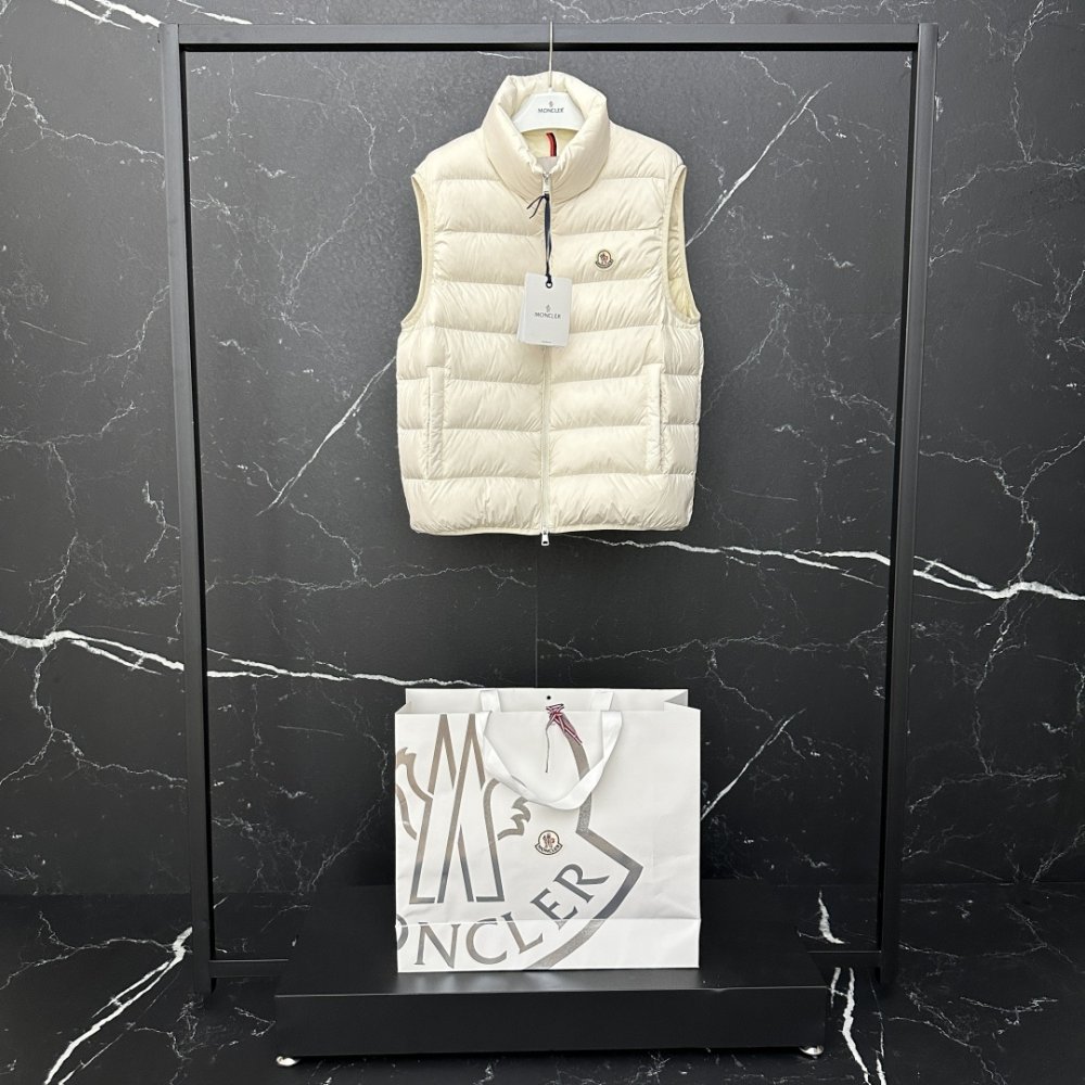 Жилетка на пуху мужская