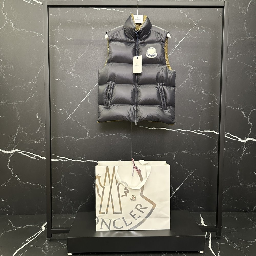 Жилетка на пуху мужская