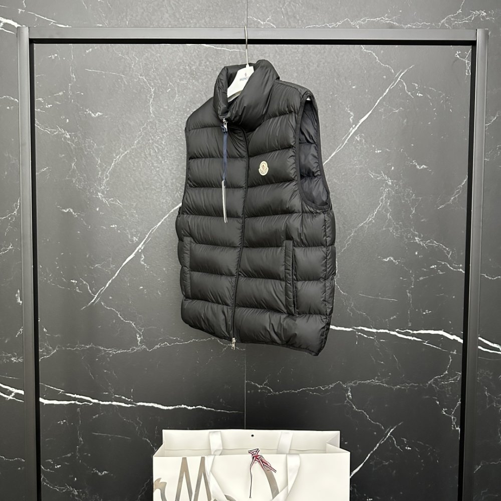 Жилетка на пуху мужская фото 5