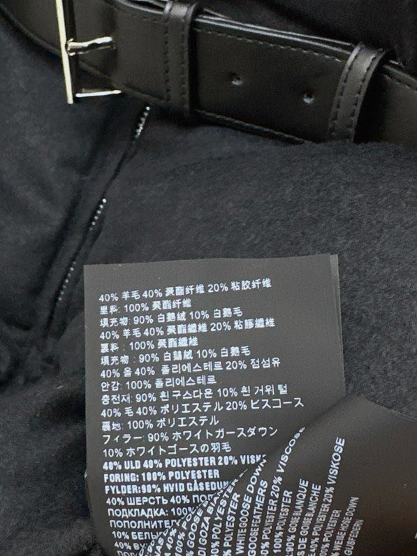 Жилетка на пуху з поясом жіноча фото 4