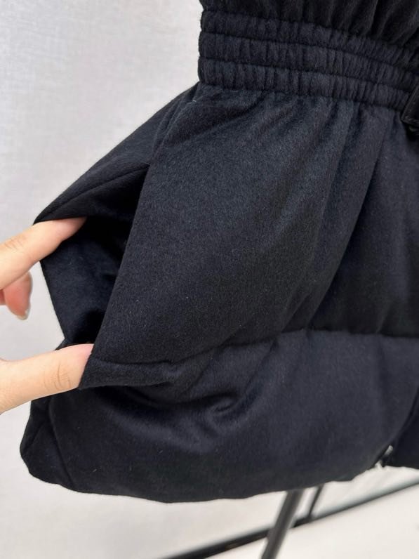 Жилетка на пуху з поясом жіноча фото 5