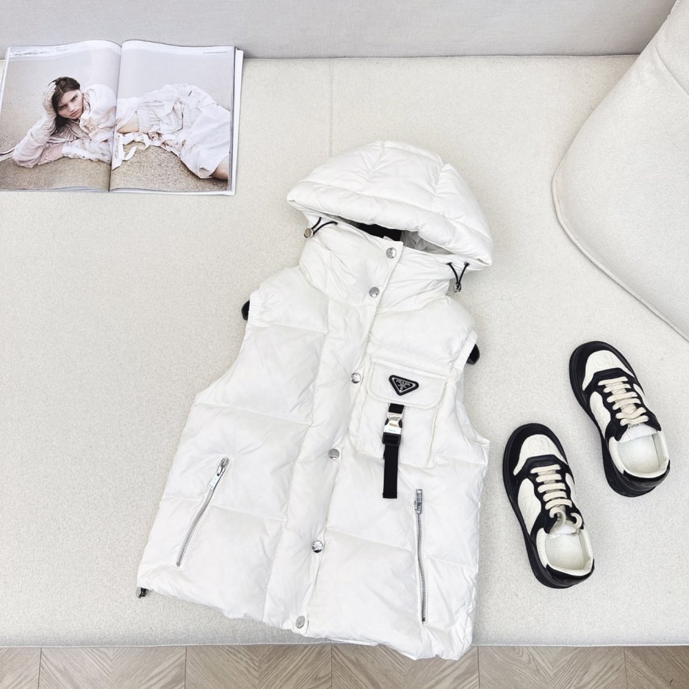 Жилетка на пуху женская