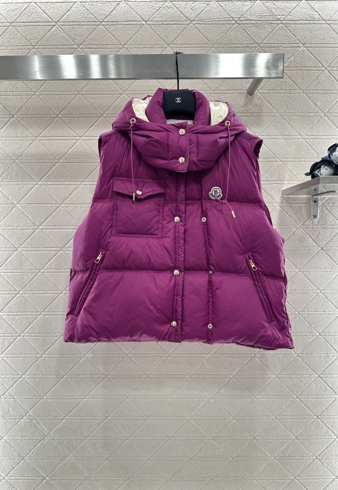 Жилетка на пуху женская