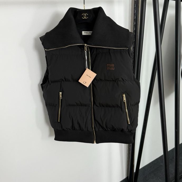 Жилетка на пуху женская