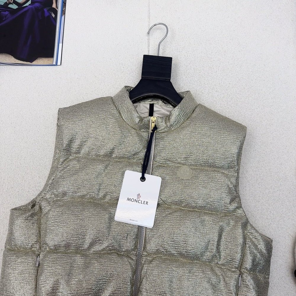 Жилетка на пуху женская фото 2