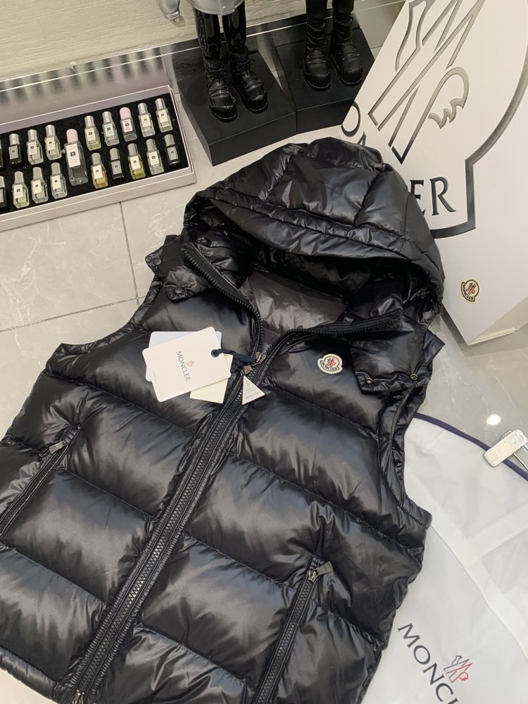 Жилетка на пуху жіноча фото 2