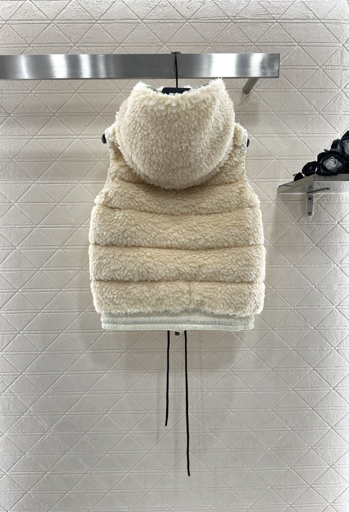 Жилетка на пуху женская фото 2