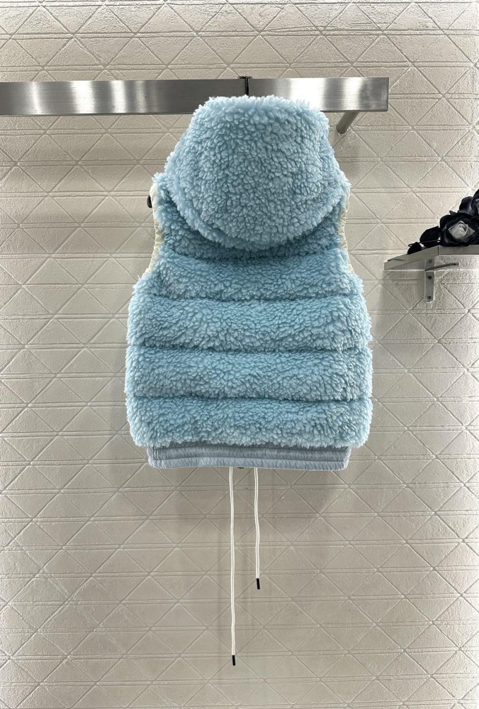 Жилетка на пуху женская фото 2