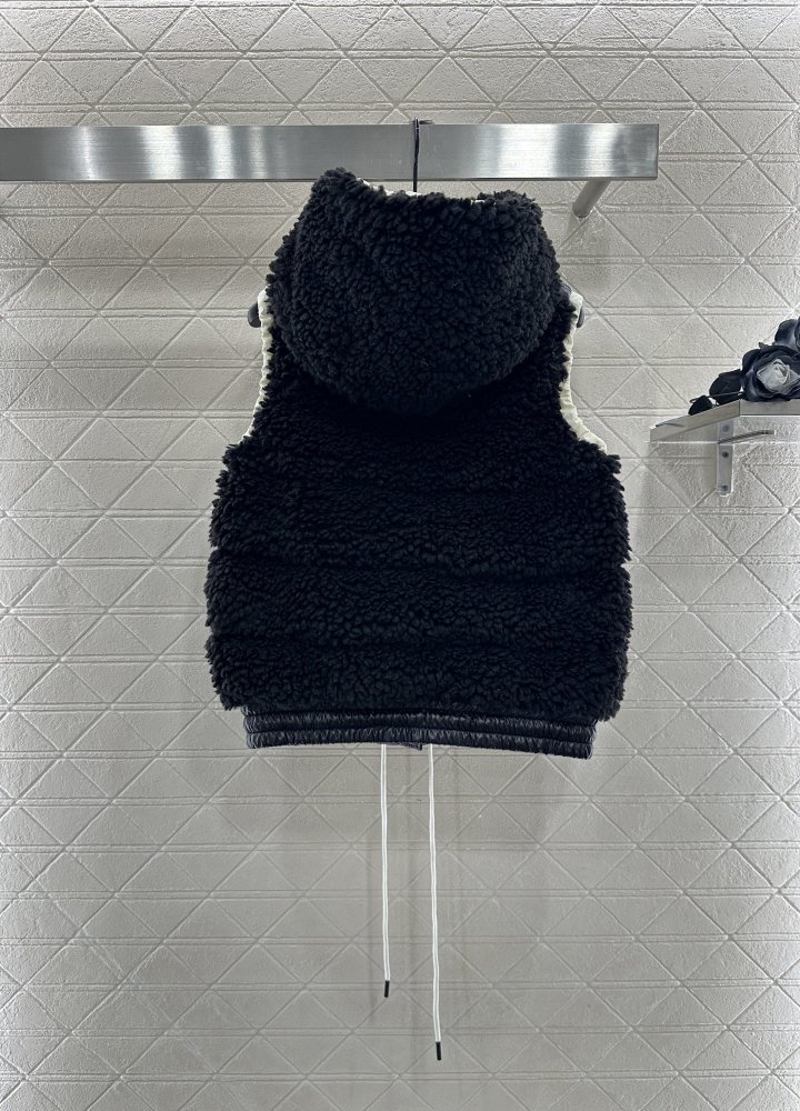 Жилетка на пуху женская фото 2