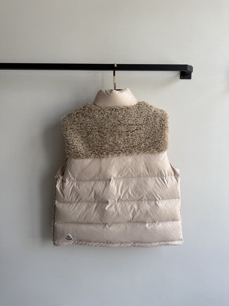 Жилетка на пуху женская фото 2