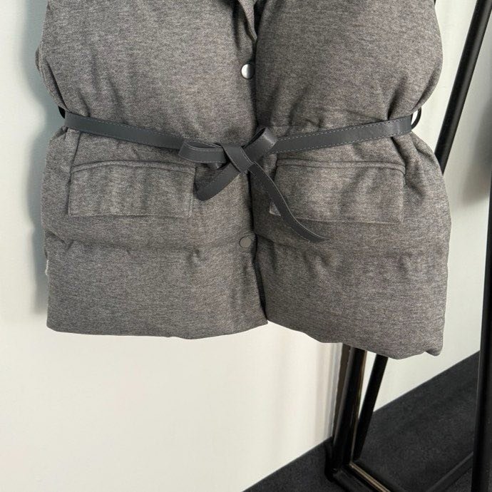 Жилетка на пуху женская фото 2