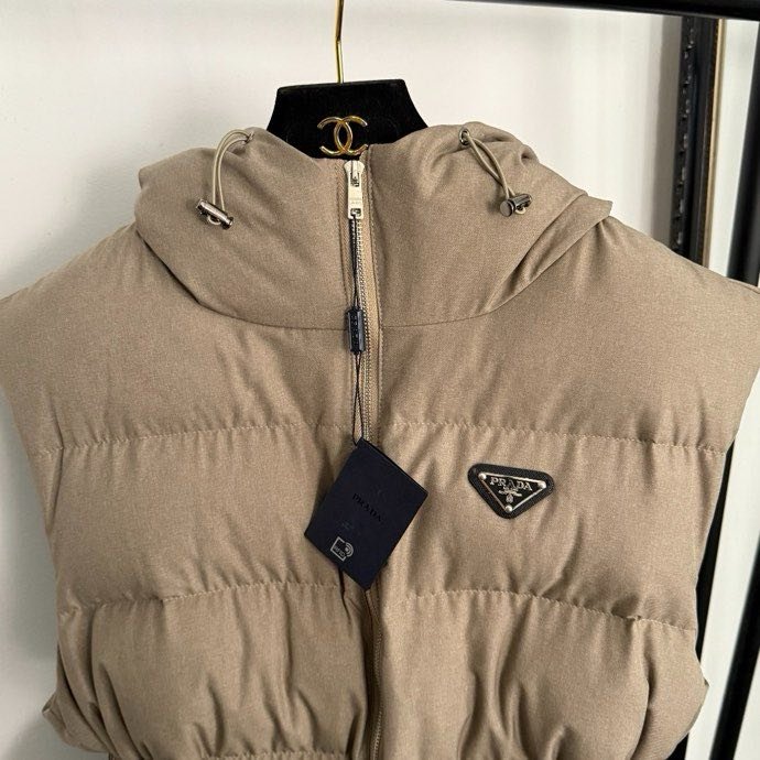 Жилетка на пуху женская фото 2