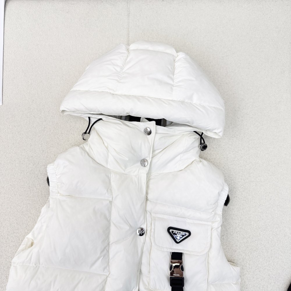 Жилетка на пуху женская фото 3