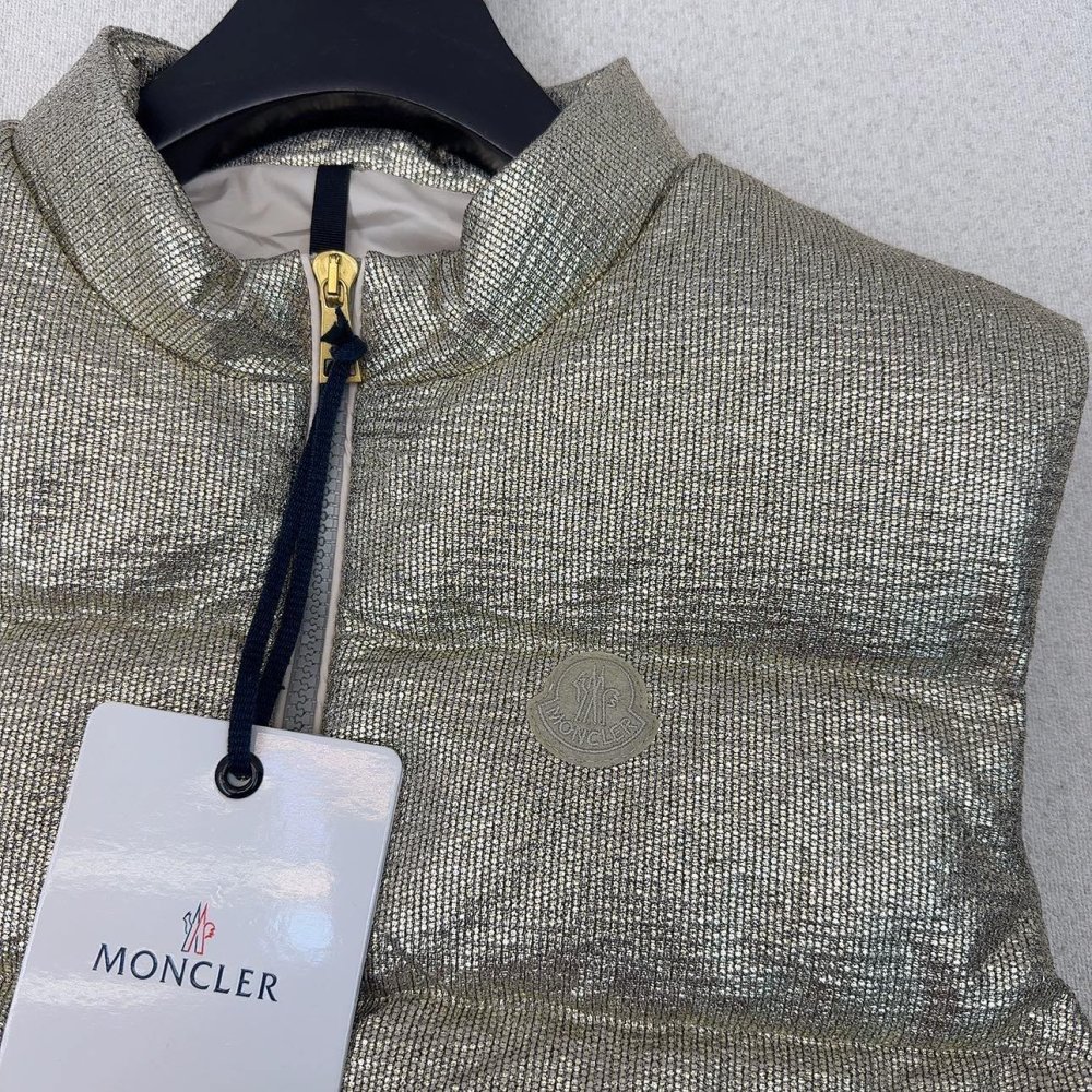 Жилетка на пуху женская фото 3